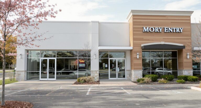 Modern Lima Ohio commercial building showcasing multiple entry door types including glass storefront, steel, and fiberglass doors, ideal for 2025 installations.